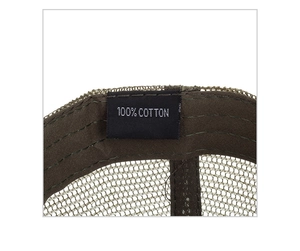 Detailed close-up of 100% cotton inner sweatband and breathable mesh on camo cap