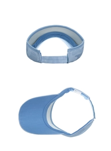 Detail of light blue camo sun visor showing 100% polyester fabric and velcro closure
