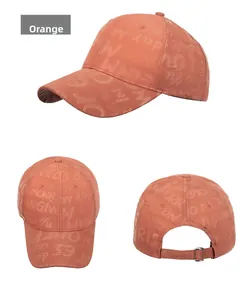 Detailed views of an orange baseball cap with letter prints and metal back buckle