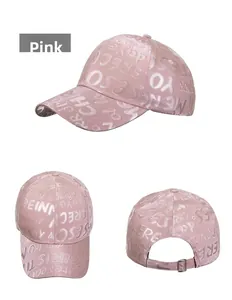 Detailed views of pink baseball cap with satin finish and all-over letter printing
