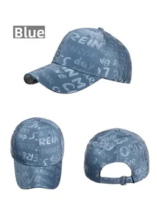 Three-way view of deep blue baseball cap with all-over graffiti style letter prints