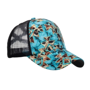 Detail view of turquoise trucker hat featuring marble patterns and breathable black mesh back