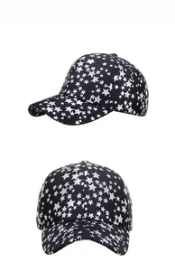 Dual-angle view of a black baseball cap featuring metallic silver star patterns all over