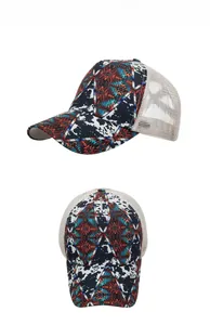 Detail of baseball cap showing bohemian geometric patterns and breathable white mesh