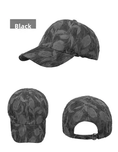 Detail view of black baseball cap showing leaf-like pleated texture and back strap adjustment
