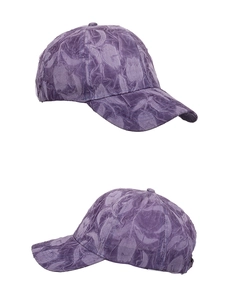 Detail view showing the textured crinkled fabric and stitching of the purple baseball cap