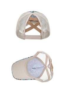 Detail view of beige mesh baseball cap showing X-shape ponytail hole and floral lining
