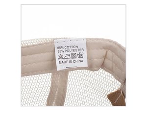 Detail of baseball cap interior showing 65% cotton fabric and breathable mesh lining