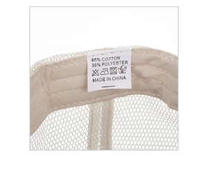 Detail view of baseball cap interior showing 65% cotton fabric and quality wash label
