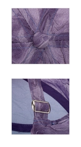 Detail of purple textured fabric baseball cap with adjustable silver metal buckle strap