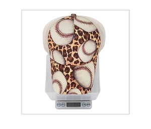 Detailed view of leopard baseball trucker hat weighing approximately 71.1g on digital scale