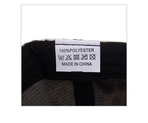 Detail view of baseball cap interior showing mesh lining and 100% polyester care label