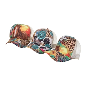 Three western style trucker hats featuring horse prints, leopard patterns and turquoise designs