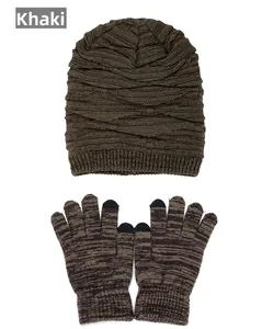 Detail view of khaki knitted beanie and touch-screen gloves with warm fleece lining