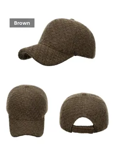 Close-up of the plush brown knit texture and durable stitching on this winter baseball cap