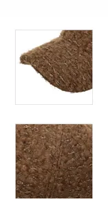 Texture macro du tissu bouclé marron épais sur le bord d'une casquette de baseball