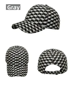 Detail view of gray baseball cap with 3D cube patterns and silver metal adjustable buckle