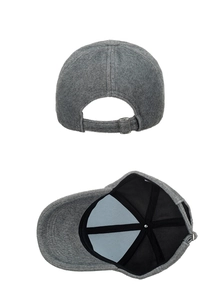 Detail view of grey faux mink baseball cap showing metal buckle and inner lining reinforcement