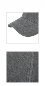 Detailed close-up of dark grey faux mink baseball cap with premium double stitching