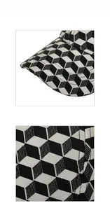 Close-up of the 3D geometric cube pattern on the thick woven fabric of this baseball cap
