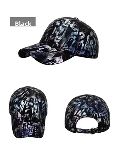 Detail view of black graffiti baseball cap with holographic prints and metal buckle strap