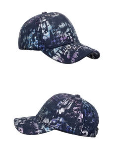 Detailed side view of navy baseball cap with holographic graffiti and houndstooth pattern