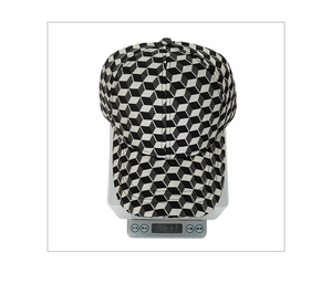 Detailed view of 3D geometric cube patterned baseball cap weighing 99.3 grams