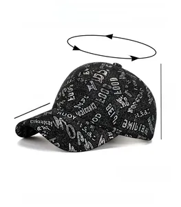 Detail of black baseball cap with white graffiti prints and adjustable strap size 56-60cm