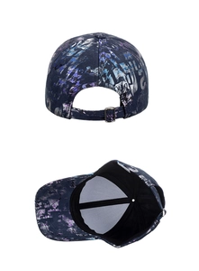 Detail view of colorful graffiti baseball cap with adjustable metal buckle and mesh lining