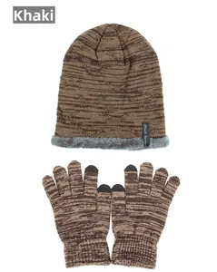 Detail view of khaki knit hat with faux fur lining and touch screen gloves set