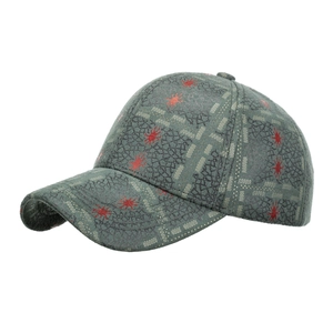 Dark cyan baseball cap with black mesh and red star pattern, 45-degree angle view