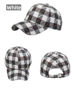 Detailed views of a white plaid tweed baseball cap featuring adjustable metal strap closure