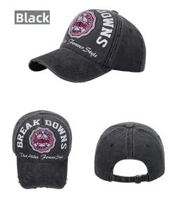 Detail view of black vintage washed cotton baseball cap with embroidered lettering and patch