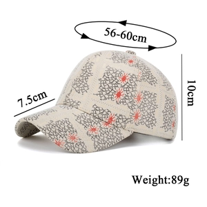 Distressed mesh pattern baseball cap in cream and red with size measurement specs