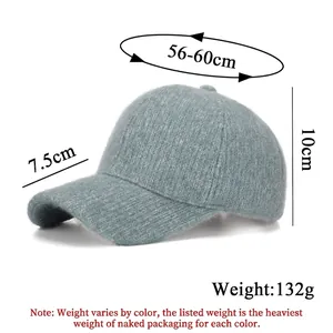 Thick warm knitted baseball cap with silver thread and curved brim in light blue-grey