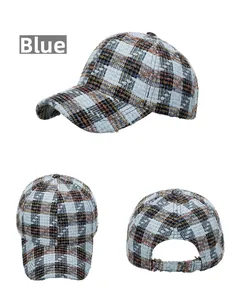 Detail view of blue plaid tweed baseball cap showing side, front and back adjustment buckle