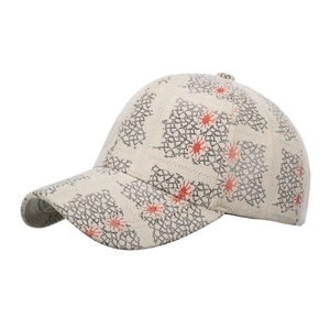 Beige baseball cap with grey geometric mesh pattern and orange splatter star print