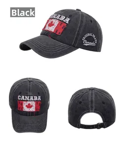 Detail of embroidered Canada maple leaf patch and vintage wash on black baseball cap