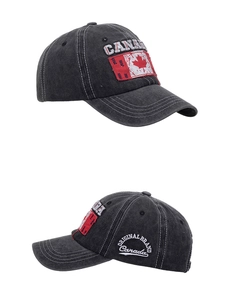 Close-up of CANADA embroidery and maple leaf patch on washed cotton baseball cap