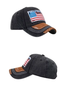 Detail view of washed cotton baseball cap with American flag patch and vintage embroidery