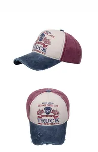 Detail view of vintage washed baseball cap with retro truck print and distressed brim edges