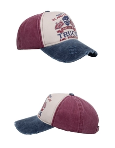 Close-up of distressed vintage trucker hat with contrast stitching and adjustable strap
