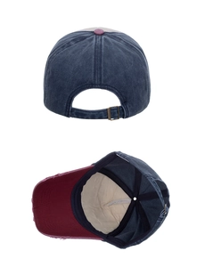 Detail view of washed contrast baseball cap with metal buckle and reinforced lining