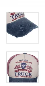 Close-up of vintage washed trucker hat featuring distressed brim and graphic print