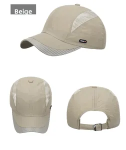 Detail view of beige quick-dry baseball cap with mesh panels and adjustable metal buckle