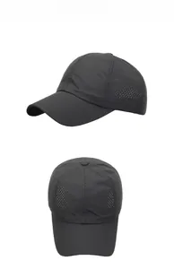 Detail showing breathable laser-cut mesh holes on black quick-dry sport baseball cap