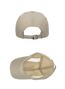 Detail view showing breathable mesh panels and adjustable metal buckle on beige cap