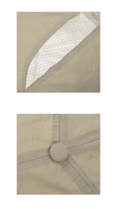 Detailed macro view of quick-dry mesh panels and stitching on the outdoor baseball cap
