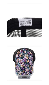 Detail view of floral mesh baseball cap showing 100% polyester label and 61.6g weight