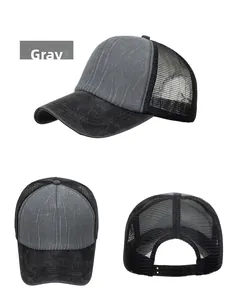 Detail view of washed vintage trucker hat showing mesh panels and adjustable snapback closure